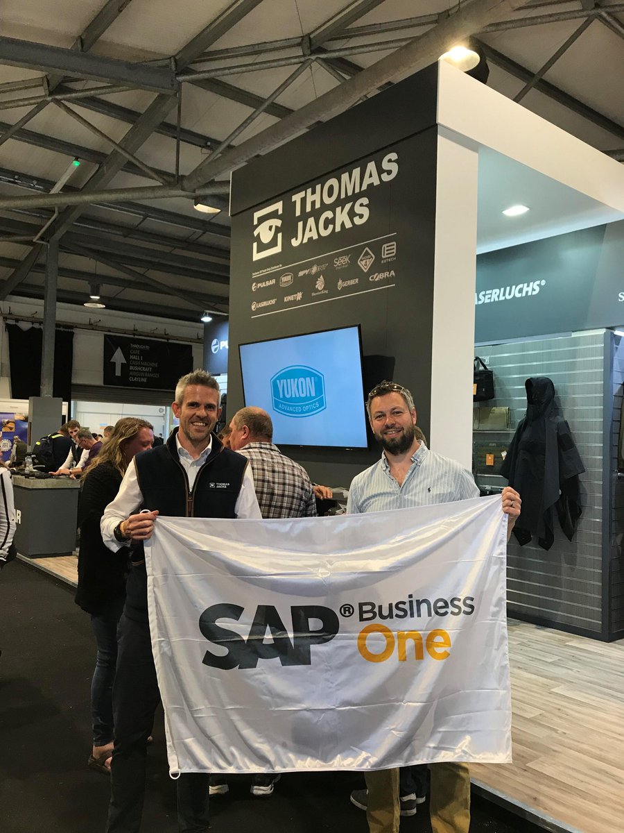 vision33_SAP's tweet photo. Lee from @ThomasJacksLtd & Andrew from #Vision33 holding up the #SAPBusinessOne flag at the @North_shootshow! Based in Stratford-upon-Avon, Thomas Jacks distributes night vision, thermal imaging, protective eyewear, lights & beacons, packs & bags, & protective gloves in the UK. https://t.co/ViGH5AyZEp