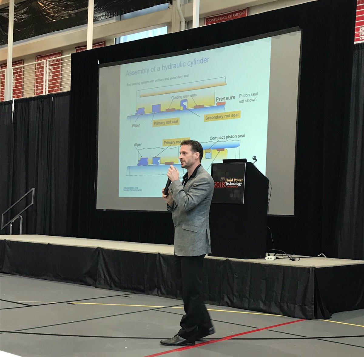FluidPowerWorld's tweet photo. John Plut from @Freudenberg_FST talks about the basics of sealing – materials, designs, surface compatibility, usage, testing procedures, environmental considerations #FPTC2018 @FPTechConf https://t.co/7DFAEjRG9x