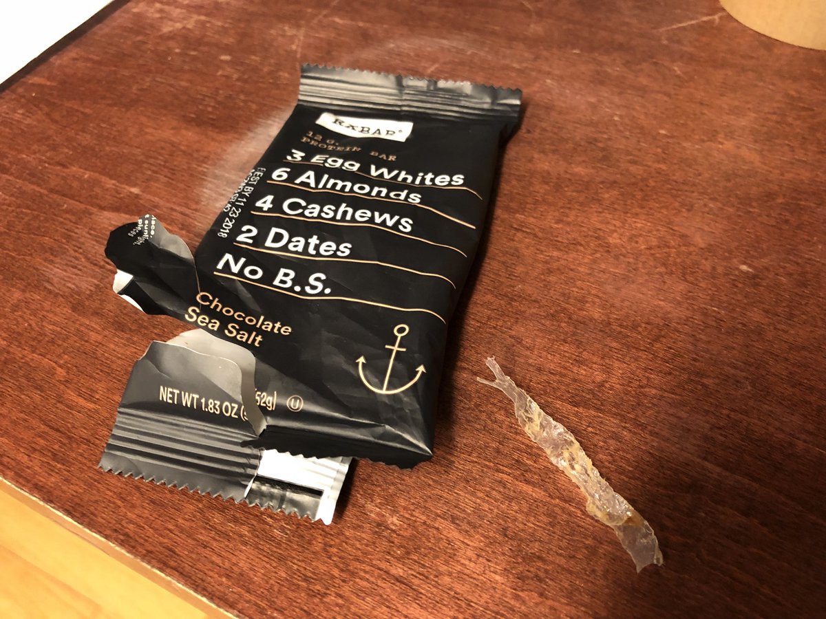 LuchFace's tweet photo. I just almost ate a piece of plastic that was inside one of these #rxbar @RXBAR wtf?! I don’t think I’ll be purchasing these anymore. 👎 https://t.co/RlWWsp21xd
