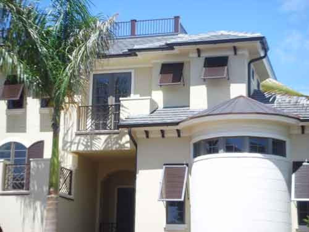 Roll_Formers's tweet photo. Recent picture of our #copper work in #Naples #Florida. This house includes a copper roof on top of a protruding turret. Notice the copper roof deck railing, copper balcony railings, and copper window shade shutters. And of course, the round copper #gutters and #downspouts. https://t.co/TeSKXGmLIX