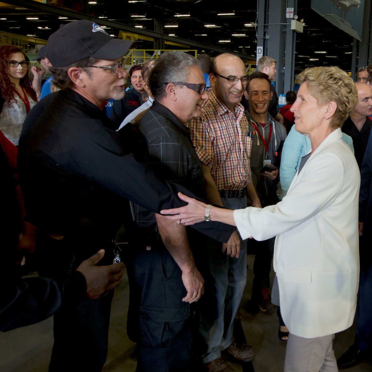 Kathleen_Wynne's tweet photo. Doug Ford wants to take away programs that create jobs, including at the aerospace plant I visited today. Andrea Horwath wants to make it harder for business to thrive with tax increases. We have a balanced plan to create opportunity so we can afford the care people need. https://t.co/1eQ3FHgtTf