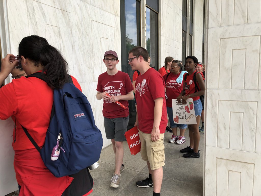 RachaelRiley85's tweet photo. Warren County teacher (right) @C_Taylor_Myers is also at today’s #MarchForStudents #RallyForRespect #Red4ED. https://t.co/wns8Z0dFxn