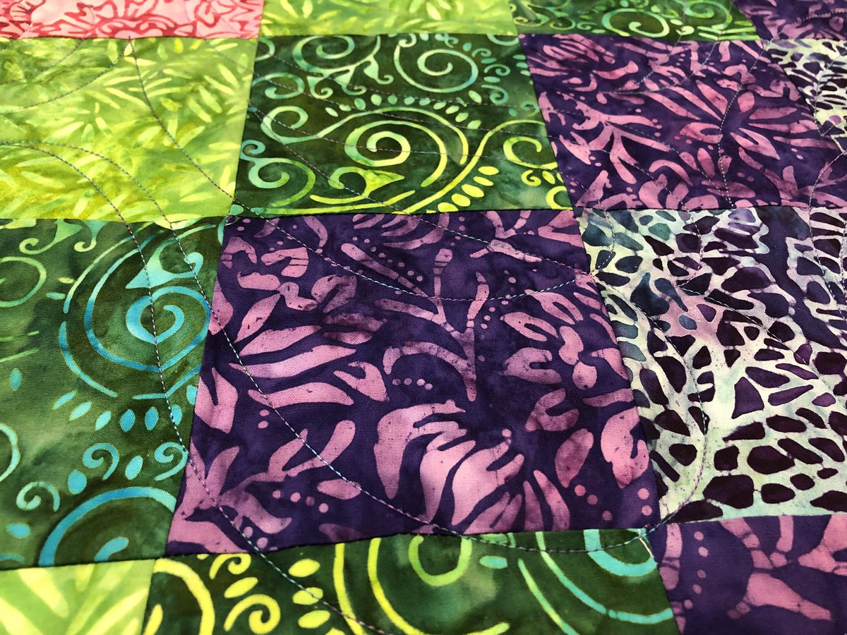 PeacefulHillQ's tweet image. Here’s a sneak peek at the quilt on the longarm today. The multicolor Fantastico thread is so pretty! #superiorthreads