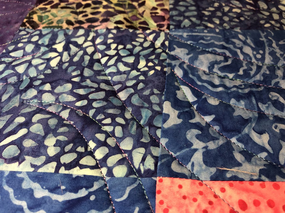 PeacefulHillQ's tweet image. Here’s a sneak peek at the quilt on the longarm today. The multicolor Fantastico thread is so pretty! #superiorthreads