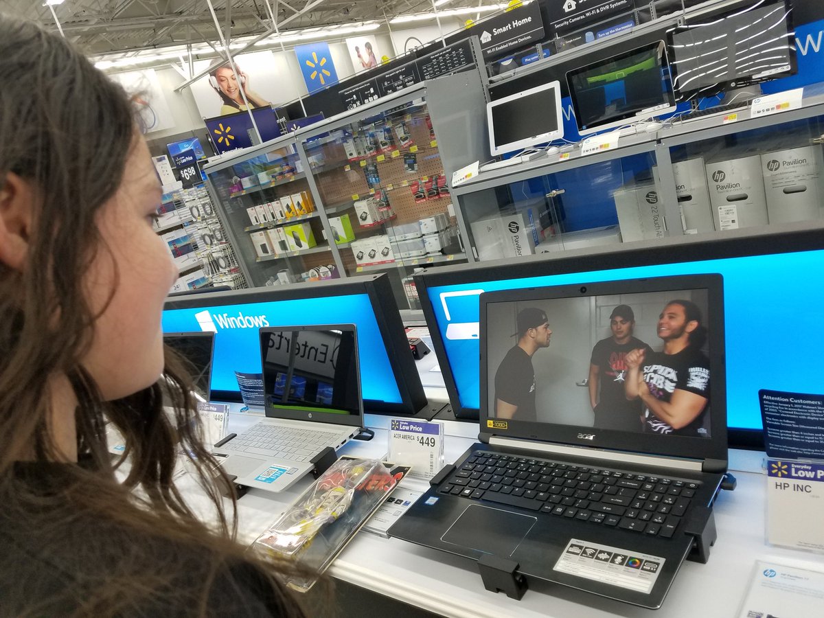 WestGhostDesign's tweet photo. That moment when you let your daughter roam around in the electronics area at @Walmart and you catch her watching #BeingTheElite #BulletClub #BookFlip https://t.co/ibLW1ZadKg