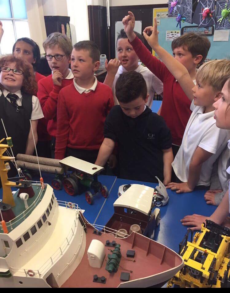 AyrGrammar's tweet photo. A big thank you to Mr Ashford for this afternoons visit into P4. They thoroughly enjoyed looking at his amazing collection of model transport and learning about transport through the years #transport #history #changesintechnology https://t.co/nKWM93ay1Z
