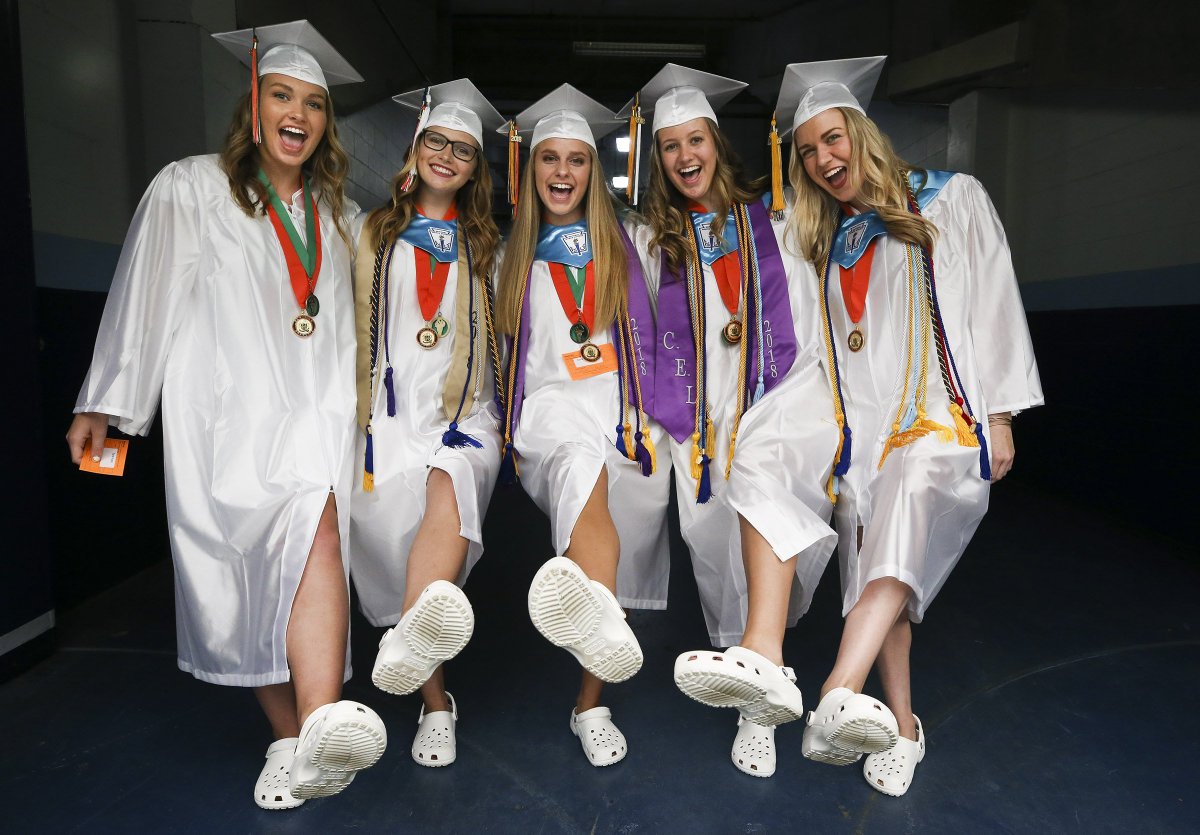 DirkShadd's tweet photo. Seminole High School seniors sport their white @Crocs during Class of 2018 #graduation2018 at Tropicana Field in @StPeteFL @sarahagee11 #PCSGrads @my_pcs https://t.co/zLSBDeH2au