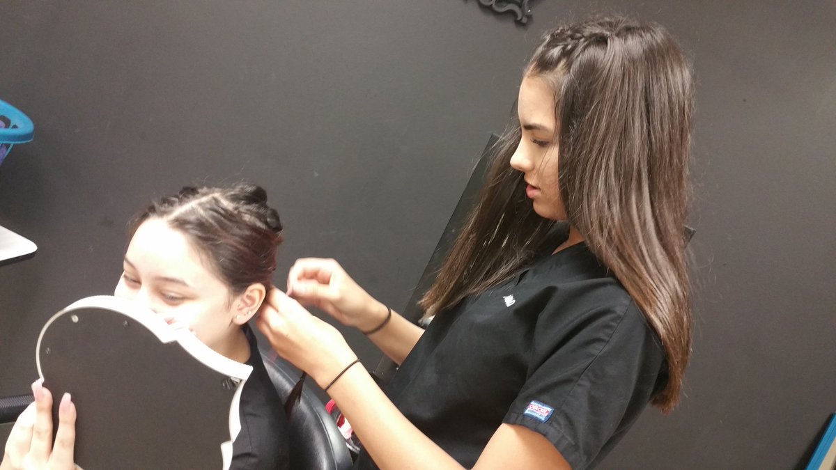 ATCCosmo's tweet photo. A-day Intro to Cosmo demonstrating Yarn Wraps &amp;Yarn Wrap Clip-in Extensions. #ATCCosmetology #Johnson https://t.co/tkjisDitHx