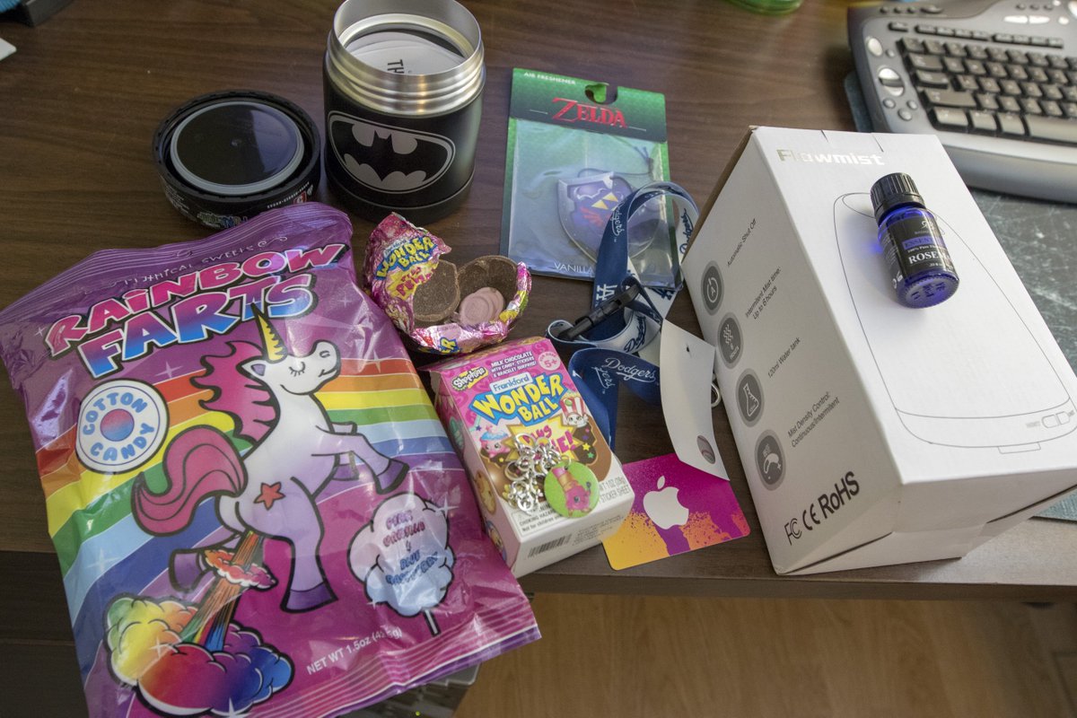 OurBaileyRayne's tweet photo. @TheBaileyRayne and you should definitely be getting those raffle tickets... I got my prize today and I know you said there would be a lot in there... but there was a lot in there! Good stuff, too! Zelda stuff! A legit oil diffuser that kind of looks like an evil robot! an itunes gift card! https://t.co/ftFgfKLxyS