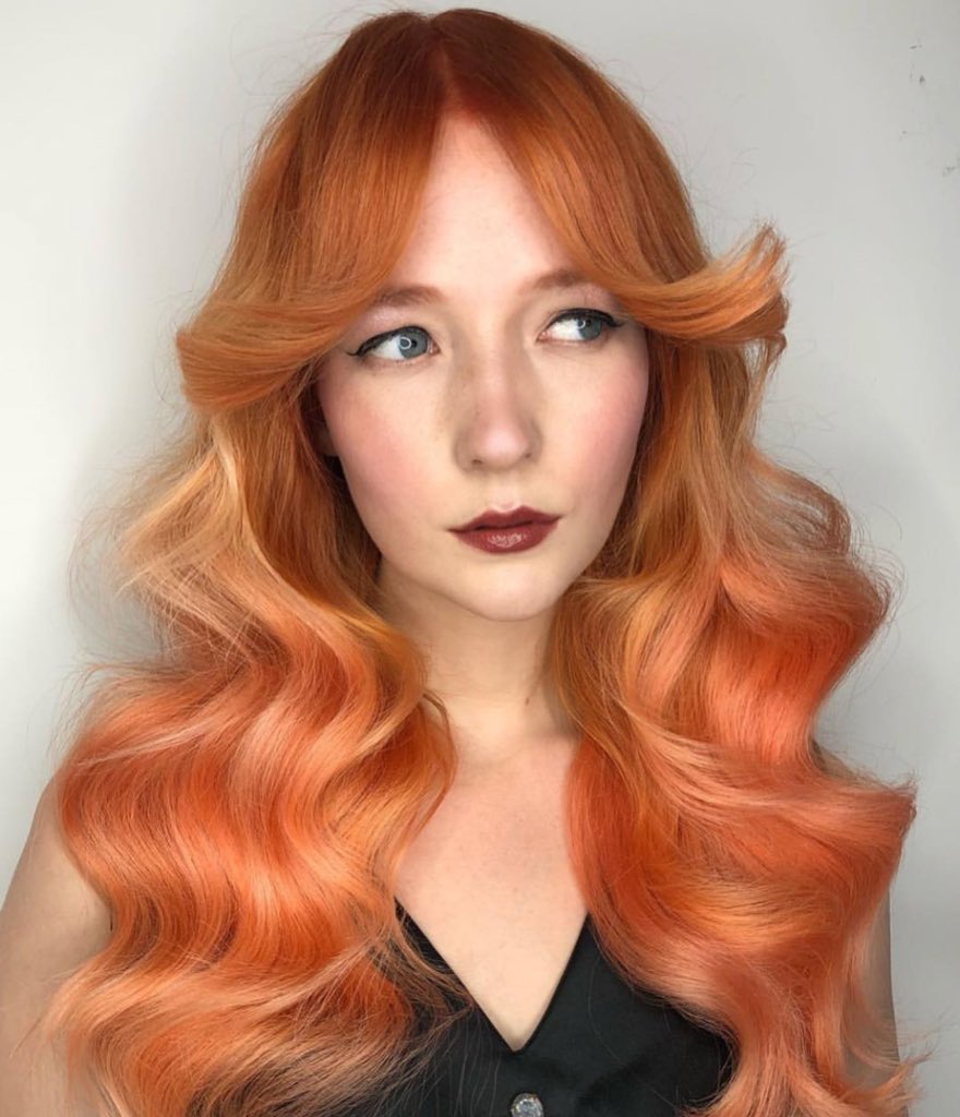 Tangerine peach dreams with a twist of 70s styling by @stephpeckmore at @badapplehair. Ultimate inspiration ahead of a busy weekend 🍊🍑 #peachhair #tangerinehair #70shair #colourinspiration #V2