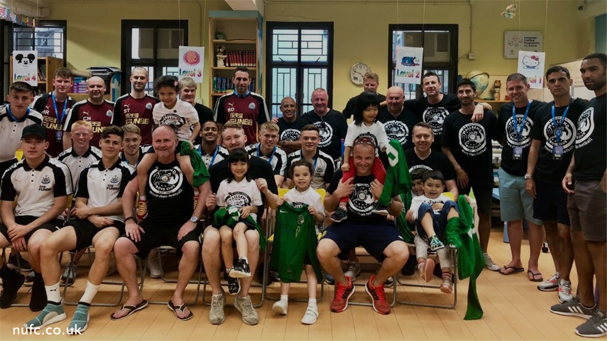 NUFC's tweet photo. Today in Hong Kong, our under-23s - together with the @WallsendBoysFC masters team - have been visiting youngsters at the Po Leung Kuk orphanage and school. Newcastle's first game is against hosts Hong Kong Football Club on Saturday. #NUFC https://t.co/TLUMlFRPUn