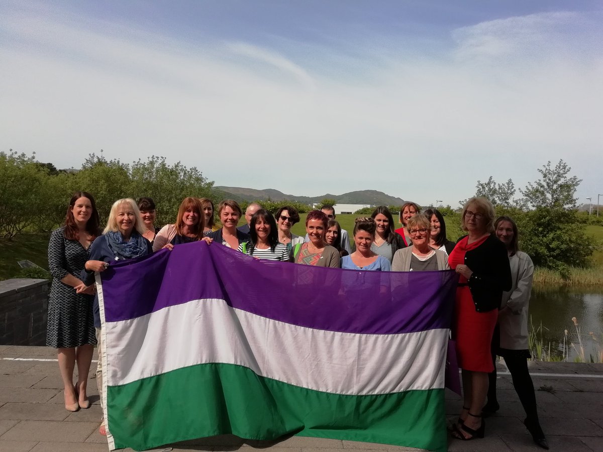 Croeso/welcome to a sunny Llandudno Junction and a photo of our North Wales members, allies and staff. @SuffrageFlag #suffrageflagrelay #followtheflag Check out that beautiful view