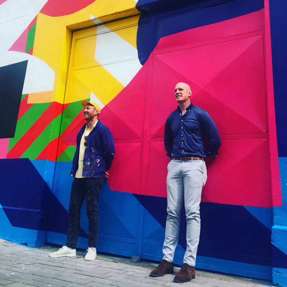 TLC_Limerick's tweet photo. @MaserArt and @Paul_OConnell unveiling the incredible street art today on Thomas Street to celebrate Team Limerick Clean-Up #TLCxMASER https://t.co/bm0gGt5MWF