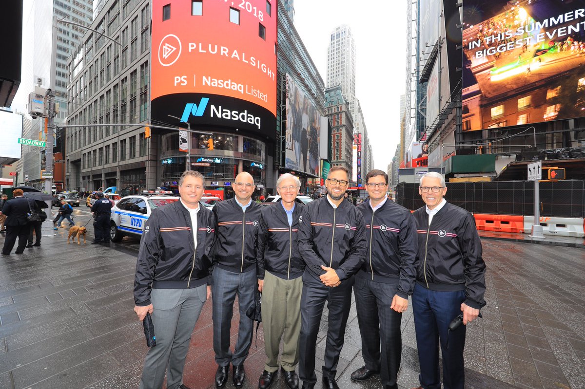 NasdaqExchange's tweet image. The pink and orange shine through on a cloudy day in @TimesSquareNYC 

💓🧡💓 #PluralsightIPO 🧡💓🧡