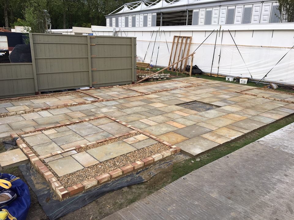 Greenhousebase's tweet photo. The paving, base work and structures for the Gabriel Ash stand at Chelsea Flower Show are almost complete and ready for dressing... teamwork makes dream work! #GabrielAsh #RHSChelsea https://t.co/uUjG0y7dsZ