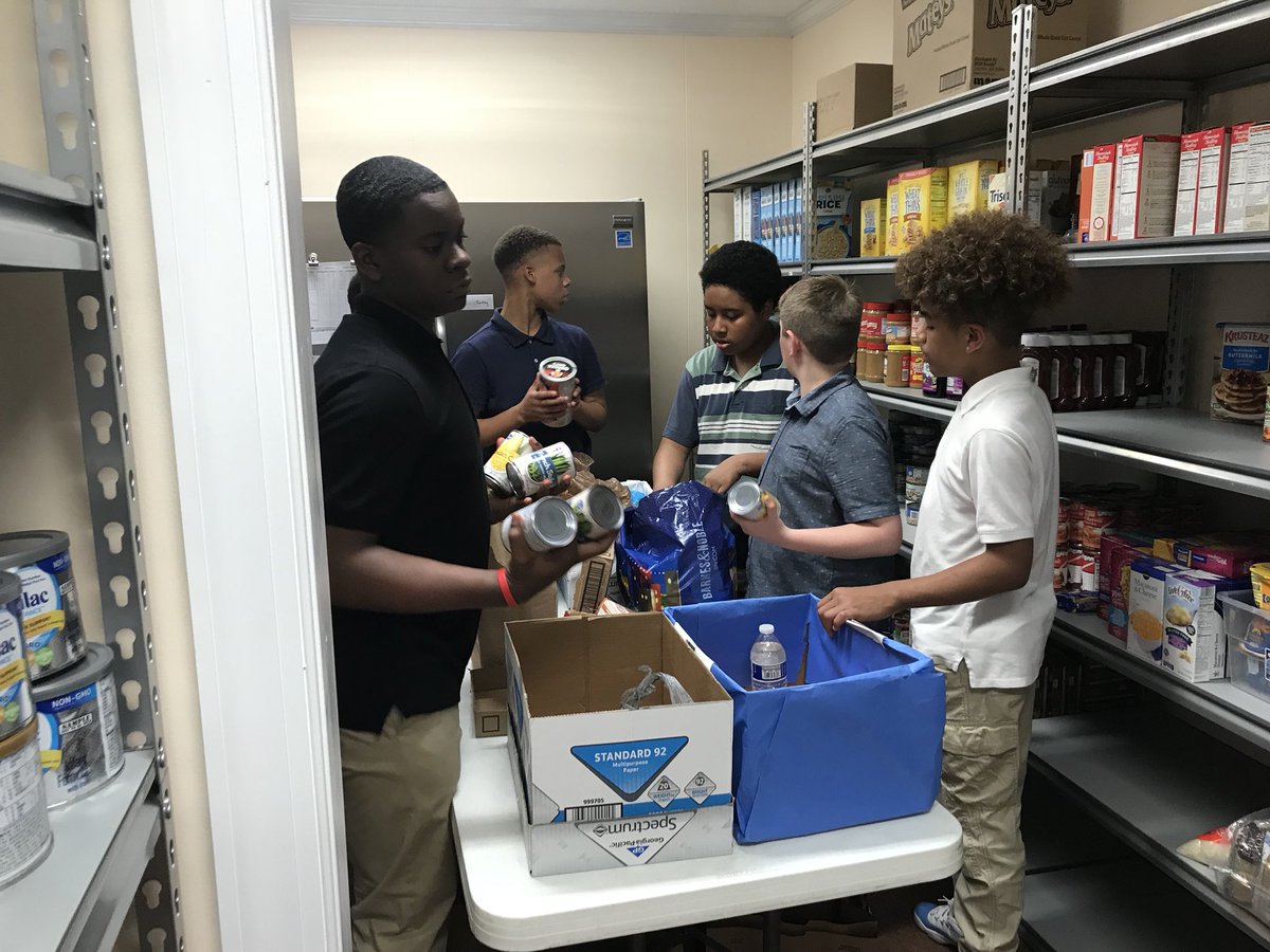 Sjudge24's tweet photo. Love that our YMOM had an opportunity to give back to the community...Shelving donated items at St. Matthias Food Bank. #buildingthebestprovidence #oneccps #ymom #pvmsrams https://t.co/seNhc6M3M0