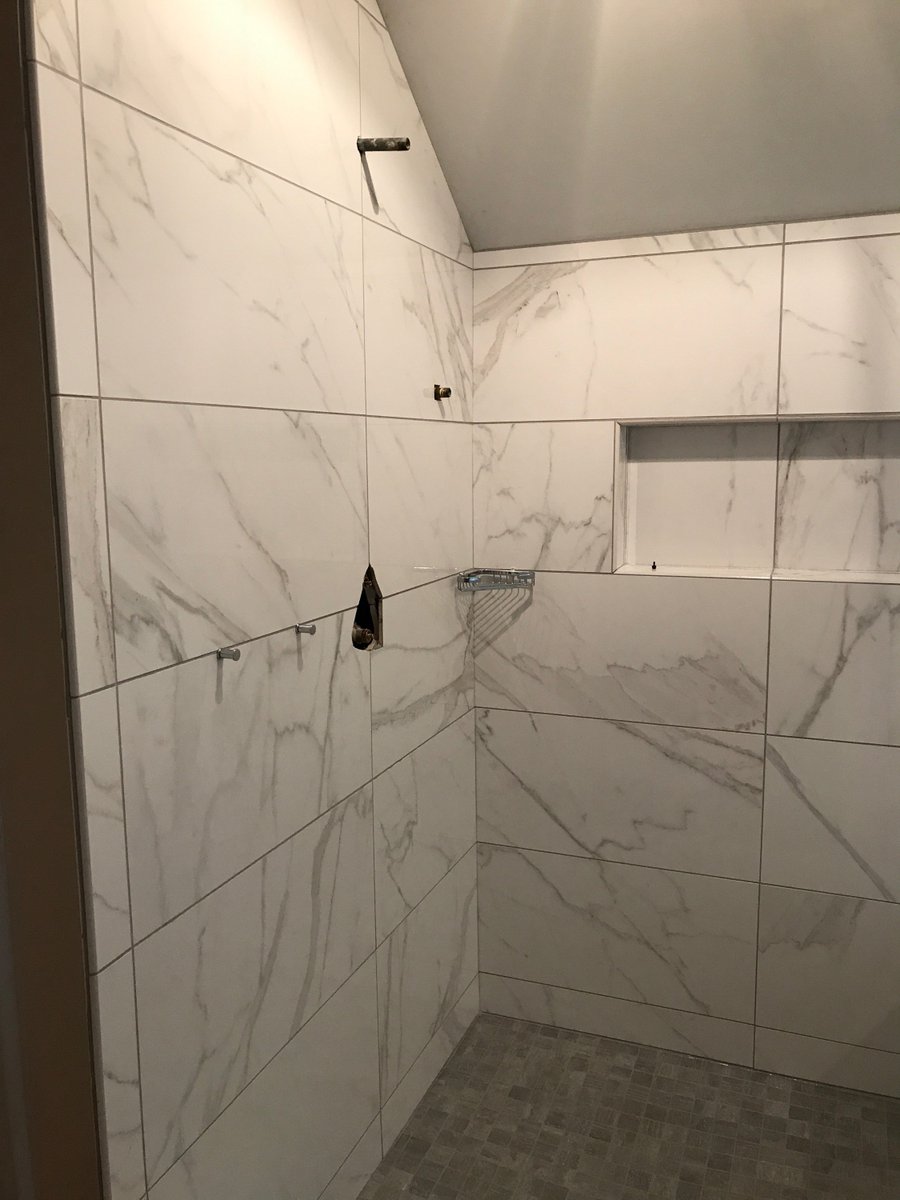 Pleased with the tile progress in this master bath!

The shower walls are a marble lookalike by <a href="/FloridaTile/">Florida Tile</a>