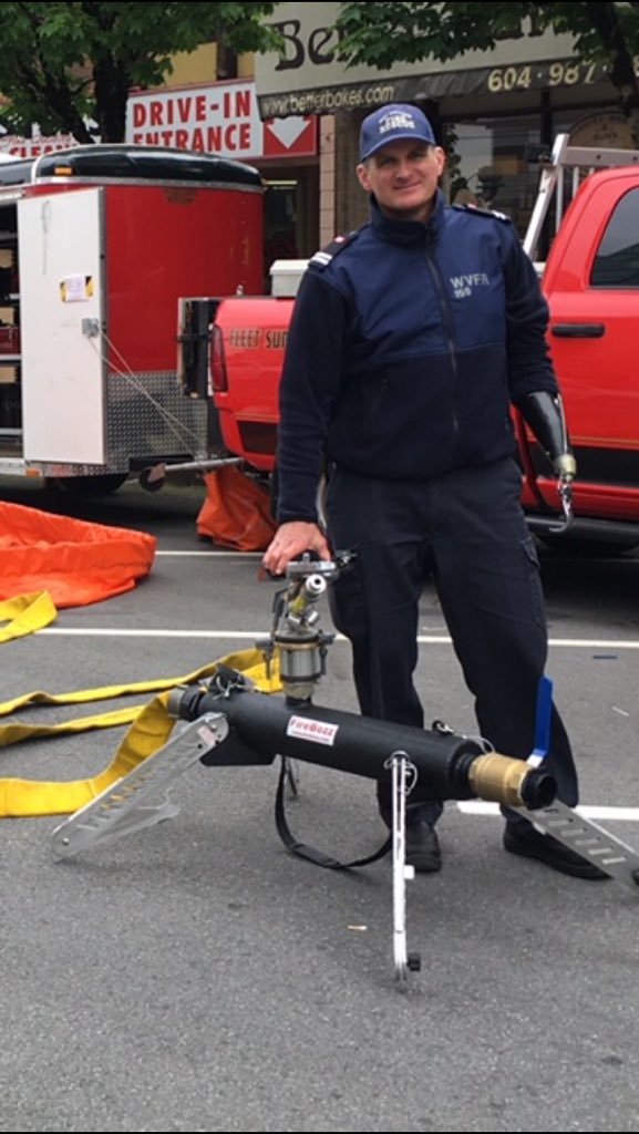 WestVanFireDept's tweet photo. Captain Clements from West Vancouver Fire Department showcasing the newest wild land interface firefighting tool.
the Firebozz sprinkler system. #wildland #DWV #WVFD #bcwildfire #firebozz https://t.co/Tlal9nl9tZ
