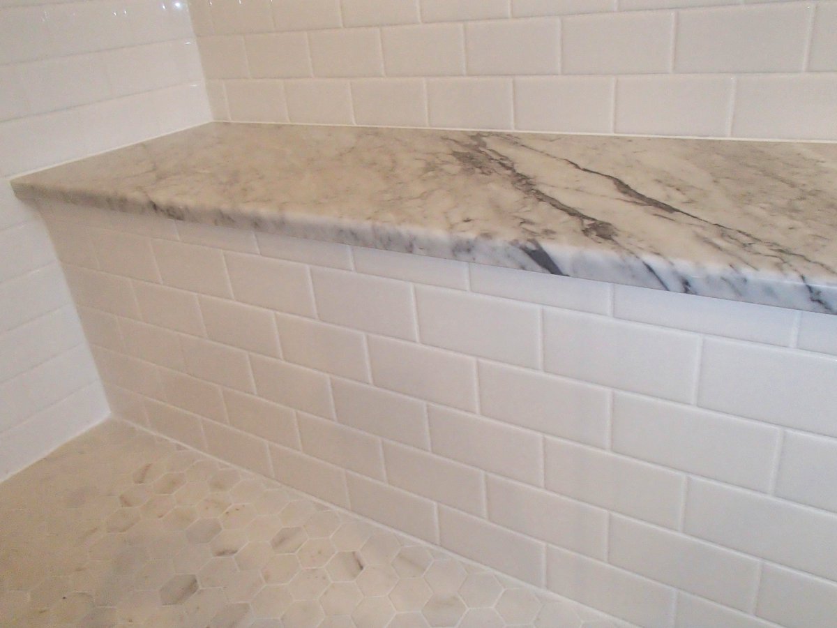 We love the classic combination of Carrara marble and white subway tile!