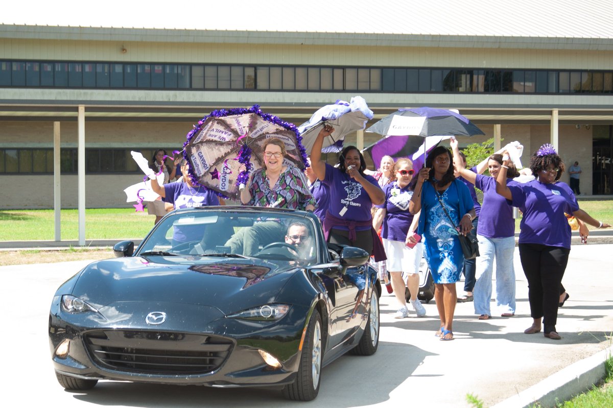 HHMSTorPride's tweet photo. A parade of smiles! #TorPride Faculty and staff celebrates the end to a "Torrific" year! #BestFaculty https://t.co/9pYb4qYZPD