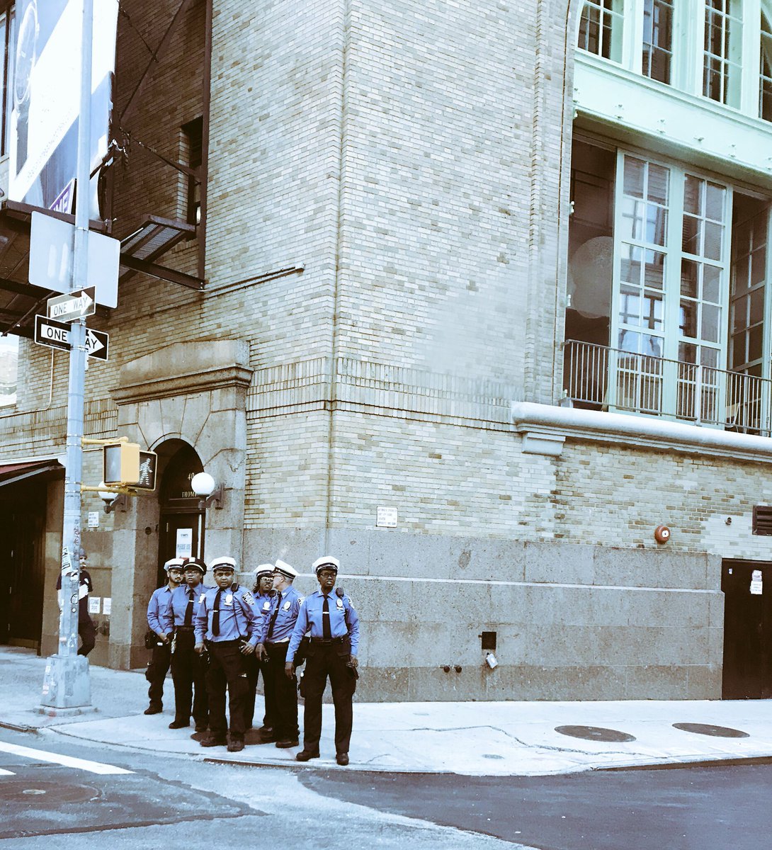 Alison__Wanders's tweet photo. Check out the #NYPD hard at work. Instead of helping to direct traffic at a congested intersection, these cops are handing out citations to people immovably stuck in traffic. #WorkingHardOrHardlyWorking #StopRealCrimes #NewYorksLaziest https://t.co/xDStFtSWKf
