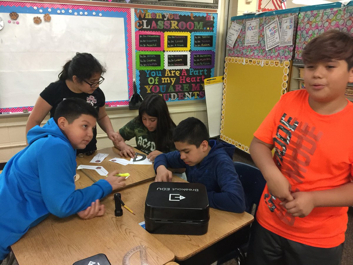 stacey_redwine's tweet photo. More pics of my class doing a Breakout edu activity. Engaging and challenging! #PISDmathchat #breakoutedu https://t.co/smcyLB5xgh