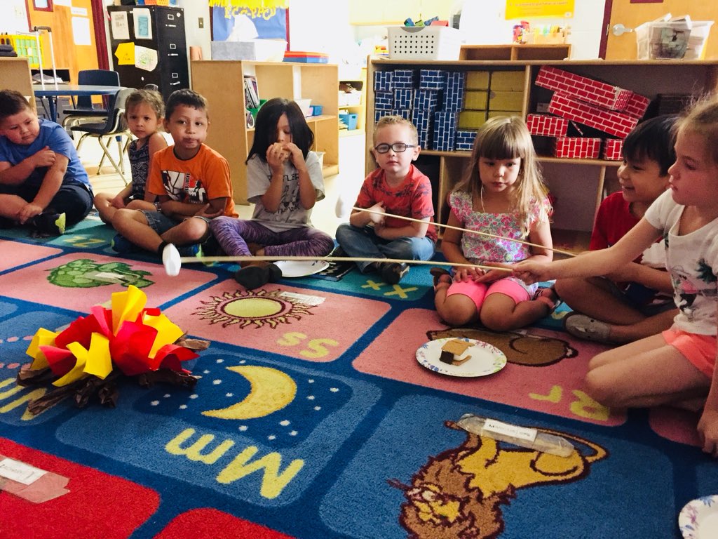 DebraCadena's tweet photo. Ss had so much fun making s’mores today! We built our own campfire to roast the marshmallows! So yummy😋 #goingcamping🏕 #rabainspired #eccppcd @NISDRabaES https://t.co/l2Cn0xKwhU