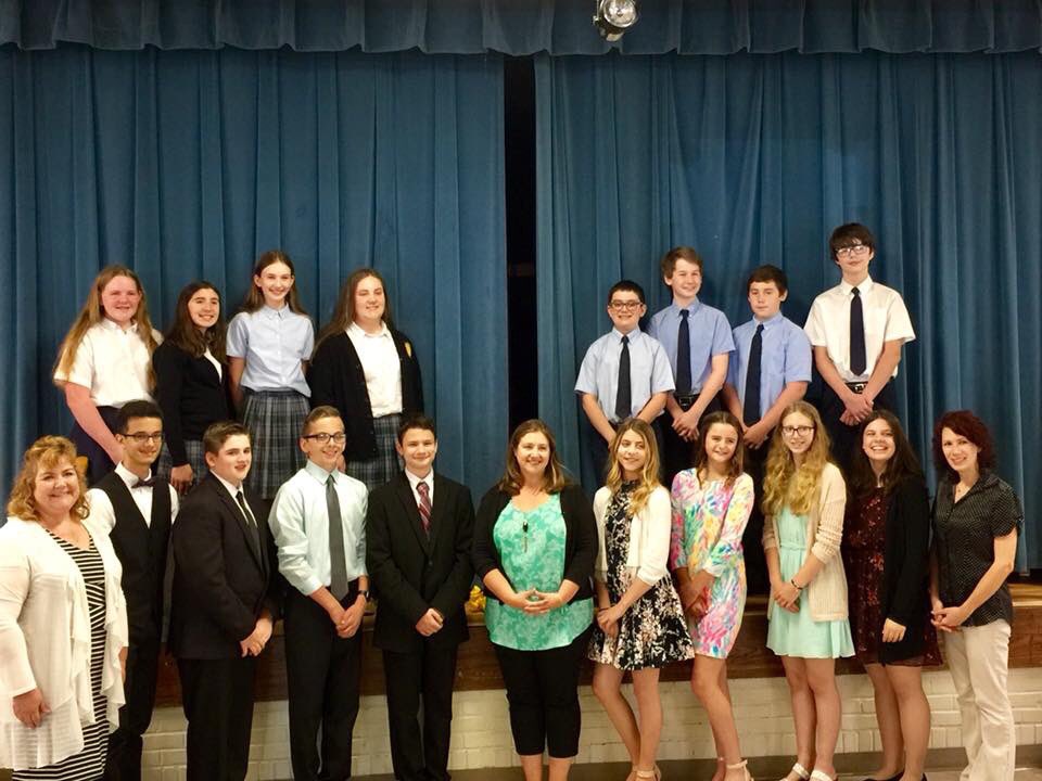StMaryRockwood's tweet photo. 8th Grade candle passing ceremony.  SO many “lasts” this year.  😢
#SMRRockets https://t.co/gxUFQe1npU
