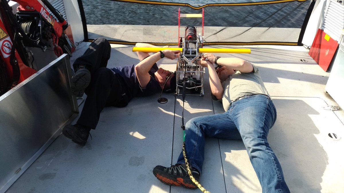 rockinrobin03's tweet photo. Laying down on the job? Nope, just @DrPlanktonguy and Captain Dallas attaching the wings on the towed sensor for our #LakeOntario #CSMI2018 #plankton #FoodWebs transect. #GreatLakesLab @FishOceansCAN https://t.co/ANhX0ANsxO