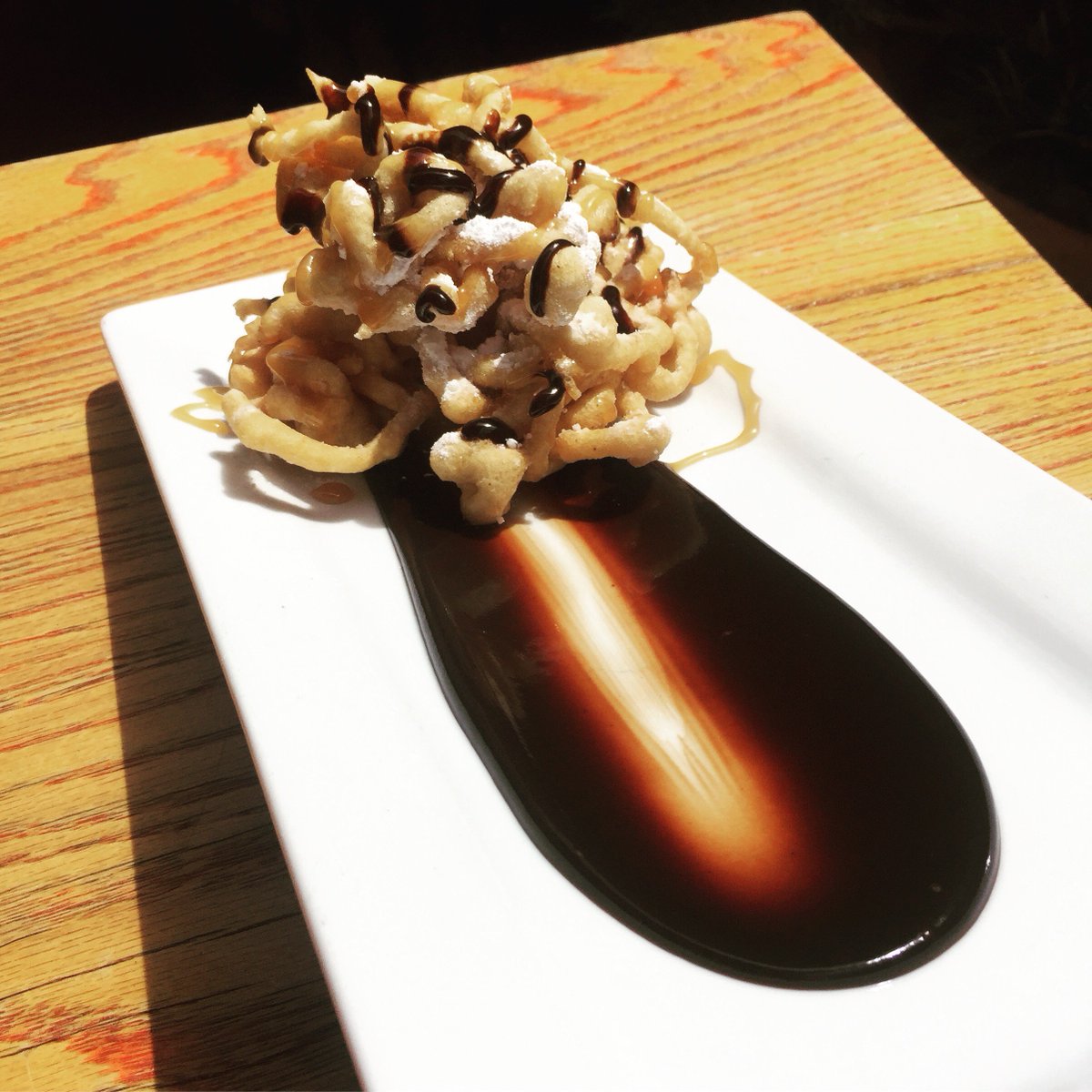 BurgerStandSF's tweet photo. Red Chile Funnel Cake. Would you like to add a scoop of ice cream? #burgerstandbyme https://t.co/l1WZ50dSBy