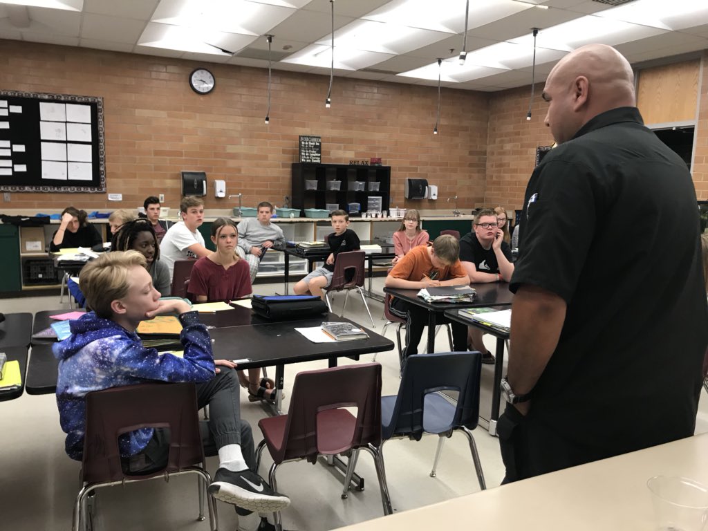 Mrs_Nevarez's tweet photo. Who done it? Detective Chavez came to visit our crime scene investigators today #MRJH. Students had to decide who should be arrested for the crime. Detective Chavez said the kids had great claims and evidence! https://t.co/shzbN0ZxtL