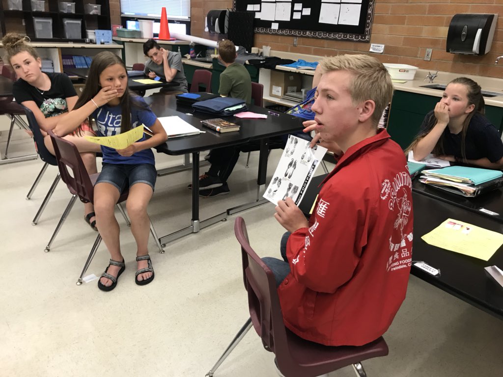 Mrs_Nevarez's tweet photo. Who done it? Detective Chavez came to visit our crime scene investigators today #MRJH. Students had to decide who should be arrested for the crime. Detective Chavez said the kids had great claims and evidence! https://t.co/shzbN0ZxtL