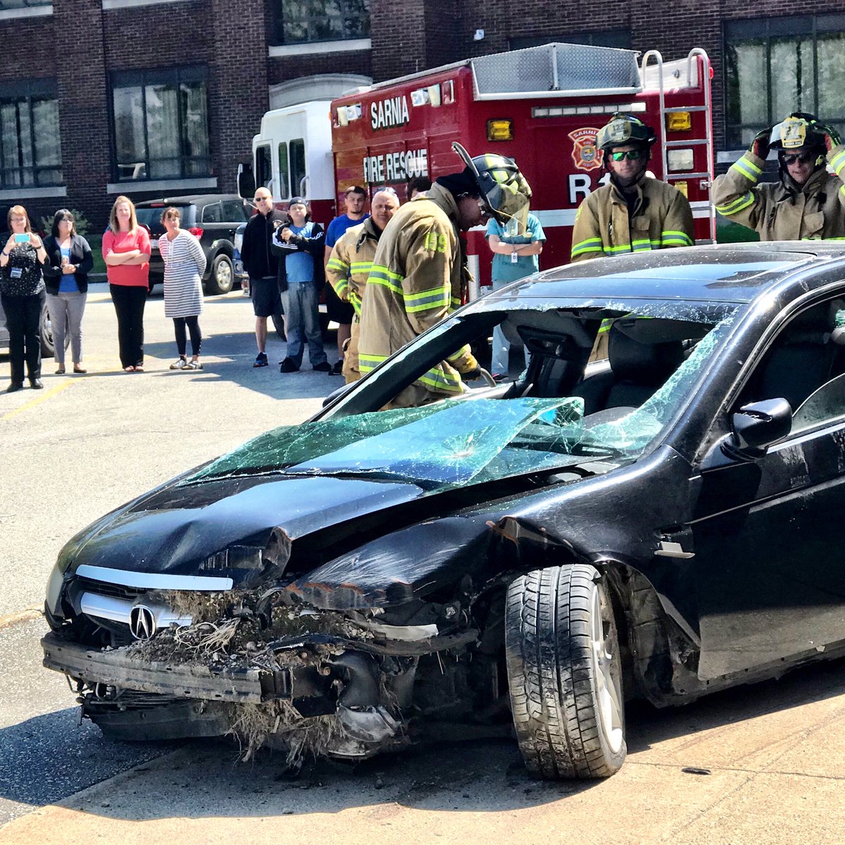 SarniaFire's tweet photo. Firefighters from @SarniaFire are at the IMPACT event on now @great_lakesss. Informing teens and preventing injuries. Visit https://t.co/Z4HpkaH7iU for more info. #wolfpackimpact #impact https://t.co/PilAXbFbA6