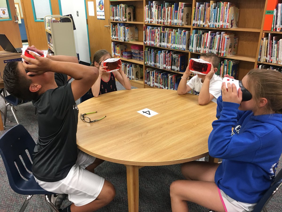 NatalieKirkley's tweet photo. Our librarian for the day is teaching us all about virtual glasses with the guidance of @CKelly_EdTech and @KarenBurt20 #weareaphe #rockwalllearns https://t.co/dyFlMZBGil