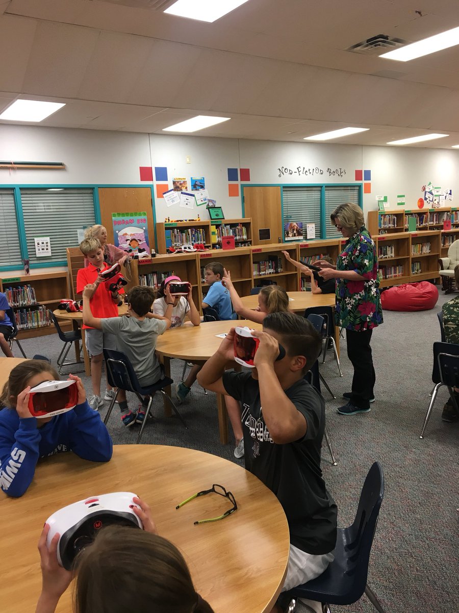 NatalieKirkley's tweet photo. Our librarian for the day is teaching us all about virtual glasses with the guidance of @CKelly_EdTech and @KarenBurt20 #weareaphe #rockwalllearns https://t.co/dyFlMZBGil