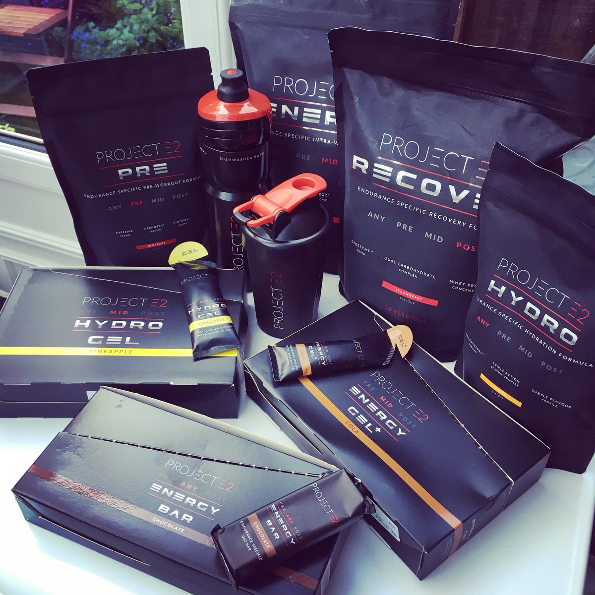 DaniNimmock1's tweet photo. Thank you @ProjectE2_HQ for this stash of #sportsnutrition 🙏🏼 It will definitely keep me going for a while 🏃🏼♀️💪🏼✨ #ProjectE2 #marathonrunning #recovery #fueltorule https://t.co/m9hMvfauqm
