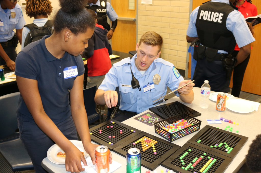 SLMPD's tweet photo. Check out photos from the "Non-Violent Video Game Challenge" at Herbert Hoover @BGCA_Clubs. Special thanks to all the officers as well as @jarms90 and @bloxelsbuilder for teaching us how to make our own video games while building bridges with the community! #CommunityEngagement https://t.co/gaAZxWKjDA