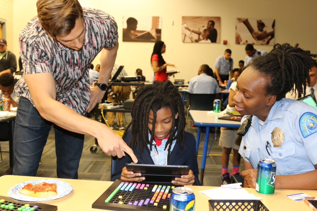 SLMPD's tweet photo. Check out photos from the "Non-Violent Video Game Challenge" at Herbert Hoover @BGCA_Clubs. Special thanks to all the officers as well as @jarms90 and @bloxelsbuilder for teaching us how to make our own video games while building bridges with the community! #CommunityEngagement https://t.co/gaAZxWKjDA