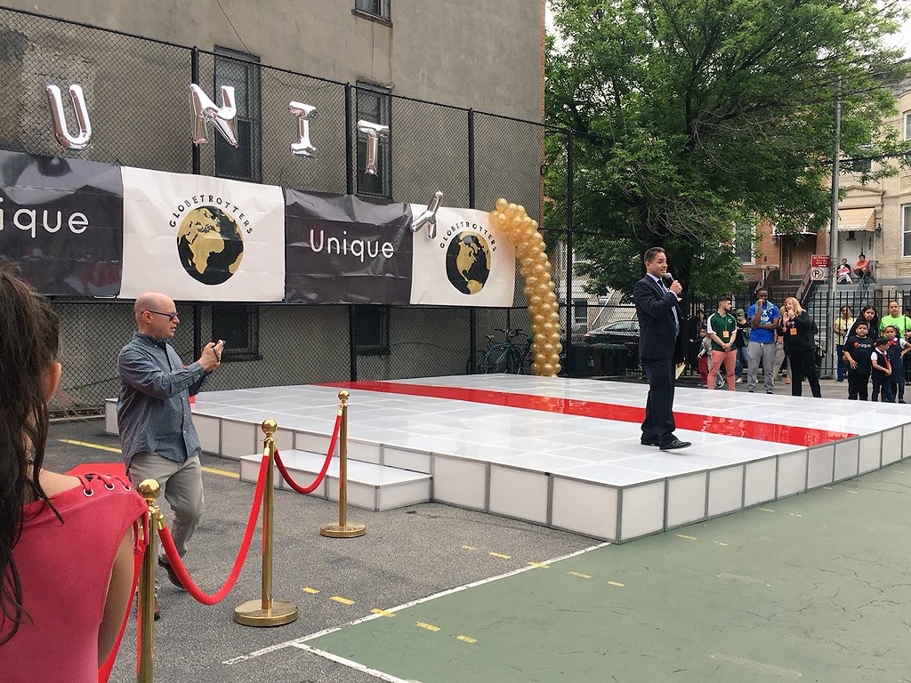 NYPD104Pct's tweet photo. The rain didn’t stop these bright students from shining. A great turn out at the #Unique Unity Fair @PS88. Children were given awards, they walked down a #RedCarpet and on to a stage! Beautiful multicultural performances done by the students. #Unique #NYPDConnecting #Ps88 https://t.co/vytfTQs9U4