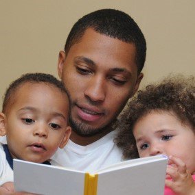 HannahsTreasure's tweet photo. Cuddle with your baby as you read a book or tell a story - it brings you close and makes reading a fun time! #diapertimetalktime #earlylearning @diapernework @2SmallToFail @penguinkids https://t.co/nrulybwAH8