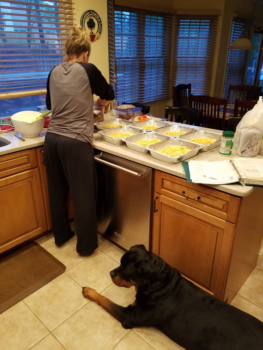 Mrs. Coach McCoy getting ready for pasta party!!  Coal is hoping she drops a little on the floor.