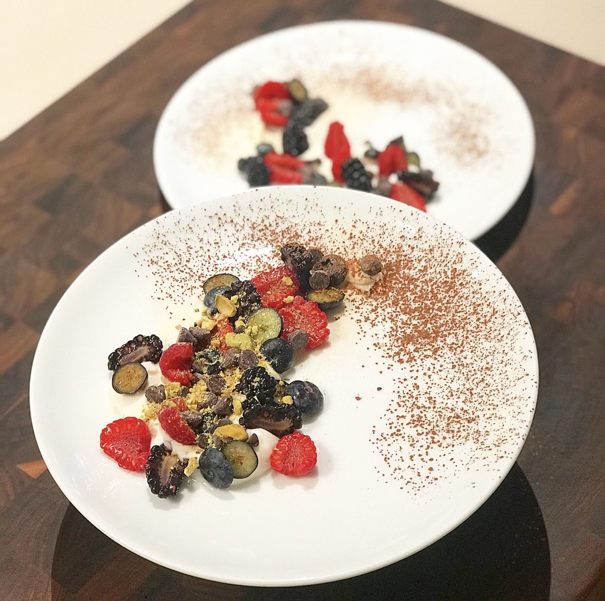 Whipped Greek yogurt infused w/ mint / vanilla soaked berries / dark chocolate / pistachio crumble #NationalChocolateChipDay