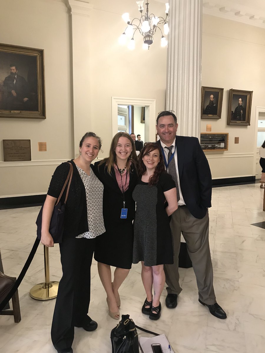 MrsHendersonHB's tweet photo. We were shocked and elated when we ran into @HB_highschool alumna/superstar Vienna at the State House on today’s #HBCivics field trip. She is interning for @GovChrisSununu this summer. Here she is with a bunch of her biggest fans aka her former #socialstudies teachers #whyiteach https://t.co/XkXDA4LZCI