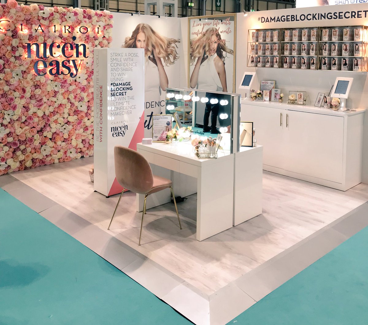 Clairol_UK's tweet photo. Who’s visiting @TMLiveEvent this weekend? Make sure to stop by the Nice’N Easy stand, let our colour experts find your perfect shade and snap a selfie at our fabulous flower wall! 🌸 #DamageBlockingSecret #TMLive https://t.co/n8ivEpwo0z