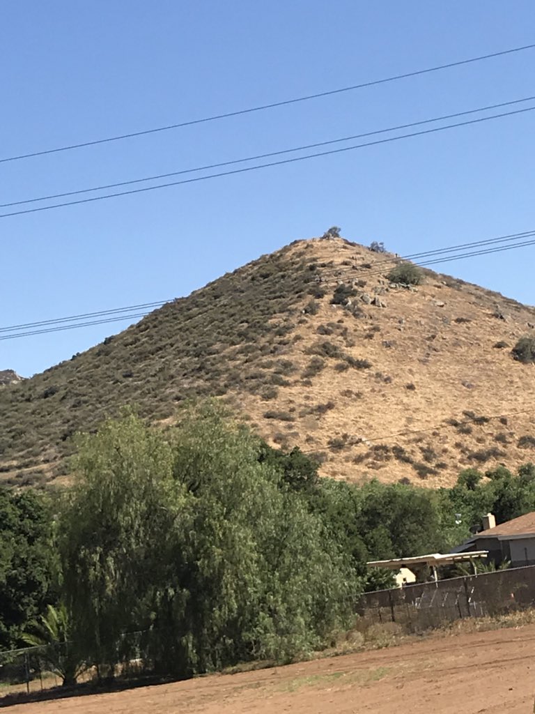 JimAlmand's tweet photo. They’ve been finding ancient pyramids all over the world. Is it possible that we have one in our own back yard in San Diego. Four equilateral flat sides, seeming to line up with compass. Is this a natural land formation? I doubt it! https://t.co/8VMMinij84