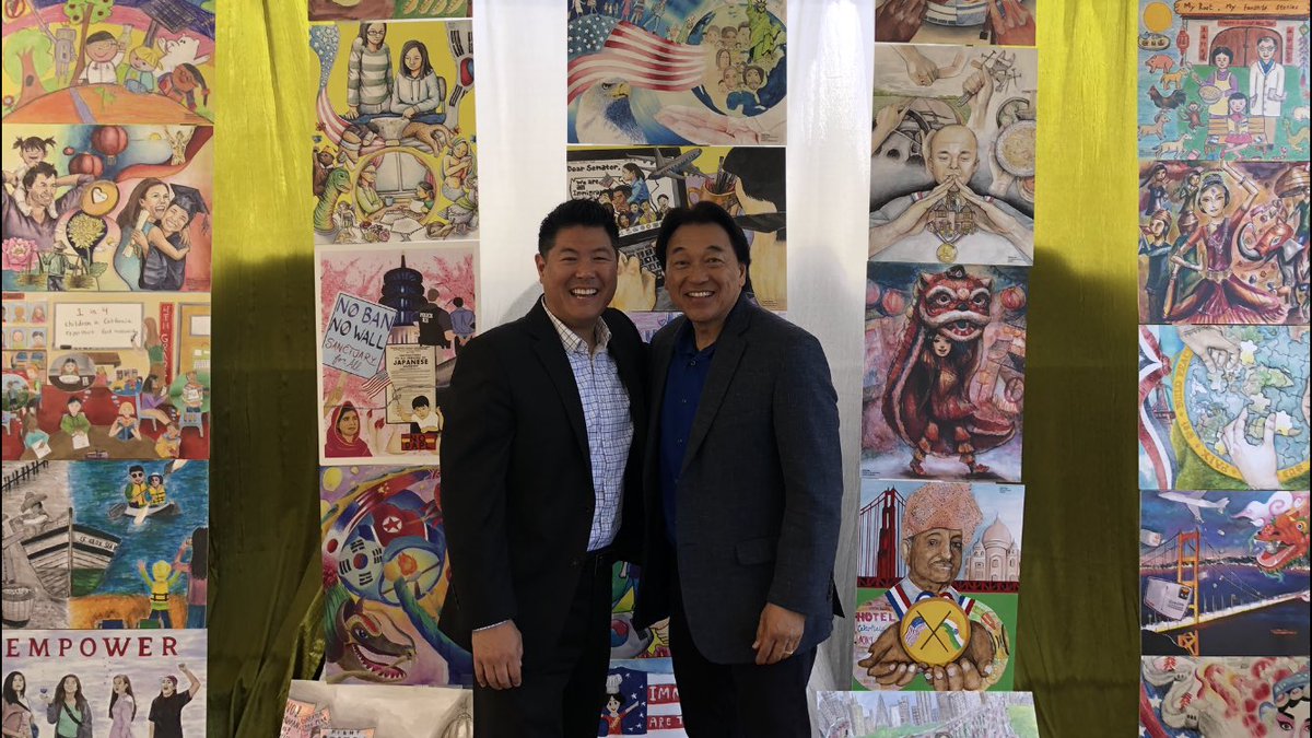 RHandaNBC's tweet photo. Mike Inouye @MikeyNoWay and I in front of wall of winning ‘art’ entries from #GrowingUpAsianInAmerica contest displayed at annual #AsianPacificAmerican Heritage Month luncheon @nbcbayarea. https://t.co/OYNlxxgqVo
