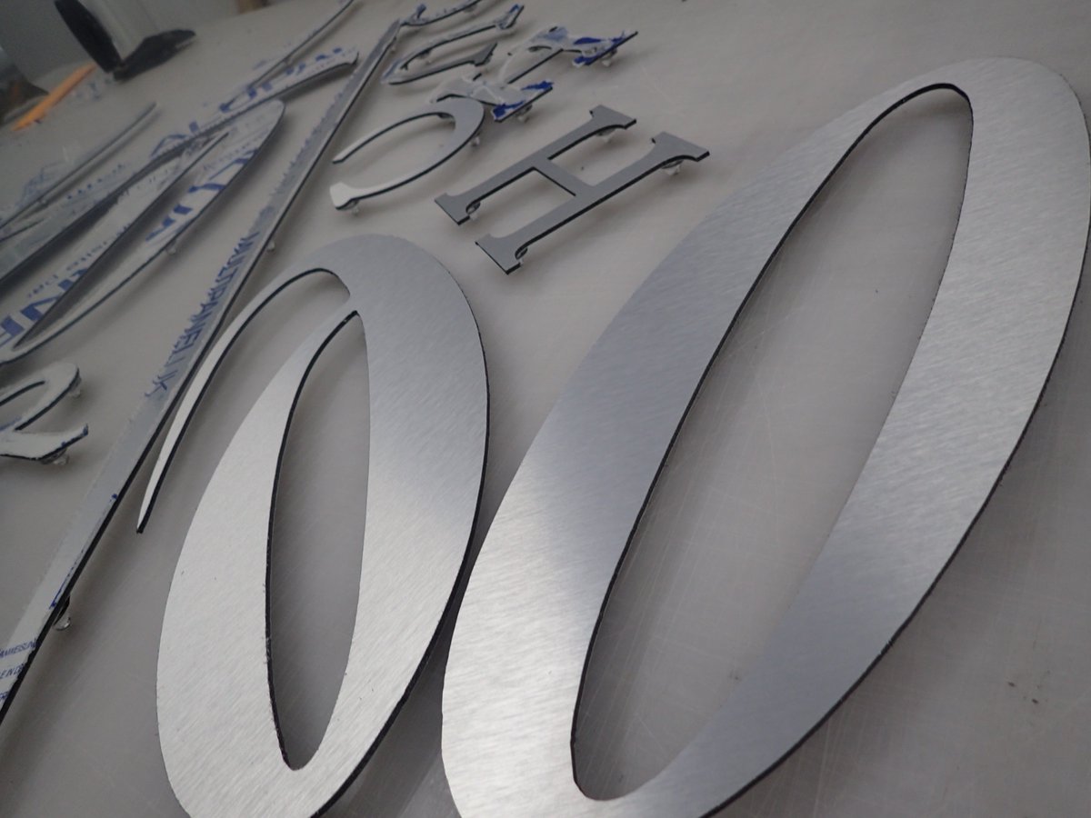 EliteSigns's tweet photo. Our #sign #production #team are doing the #quality checks on the #Brushedeffect #StainlessSteel #flatcut #lettering 😍 before #installation next week for #HopeChurch #Aberdare https://t.co/ZMxkmHKd2t