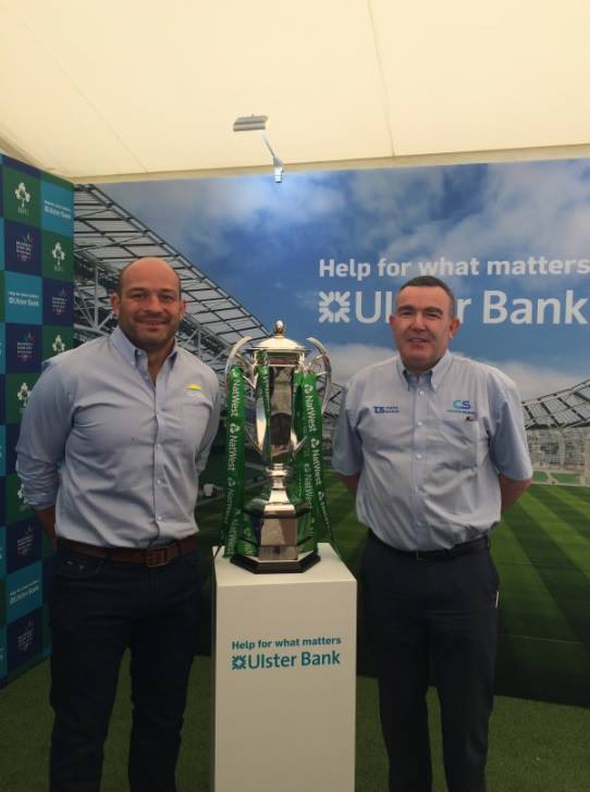 TrophySourceNI's tweet photo. Our very own Stephen meeting the grand slam winning captain Rory Best with the Six Nation trophy🏆 at the Balmoral Show  #irfu @RoryBest2 #balmoralshow2018 😃 @CentralSourcePR https://t.co/Jxy1ngtLRg