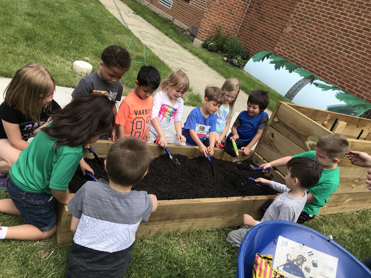 Planting in the Washington School garden! #d75learns