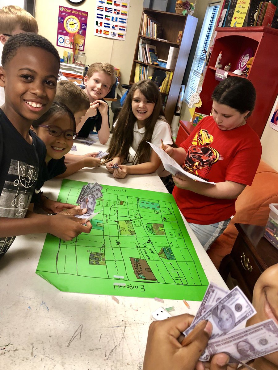 PESLowerSchool's tweet photo. 4th grade made board games in Spanish! Playing with 3rd grade https://t.co/1zoPARkBqd